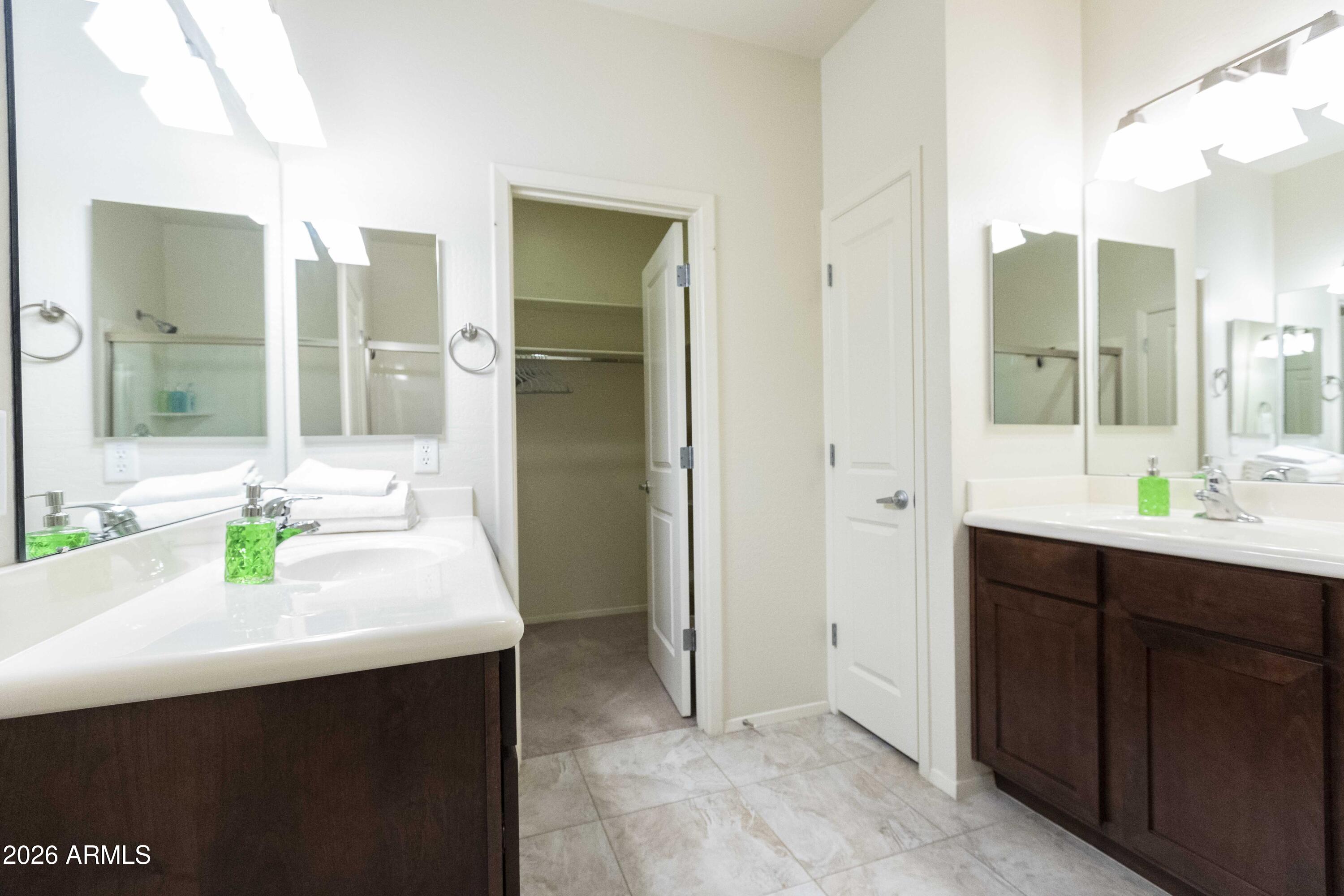 3113 East Danbury Road, Unit 22 Phoenix, AZ 85032 - Photo 11 of 17 a bathroom with a sink vanity and a mirror