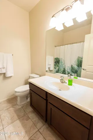 a bathroom with a sink a toilet and a bathtub