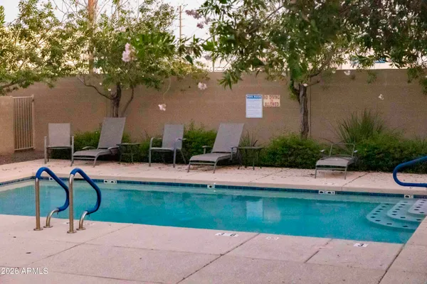 a view of swimming pool and patio