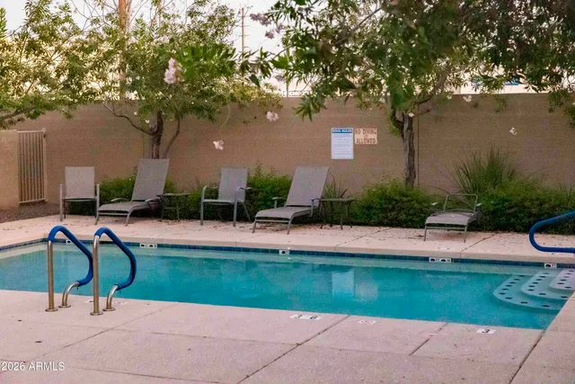 a view of swimming pool and patio