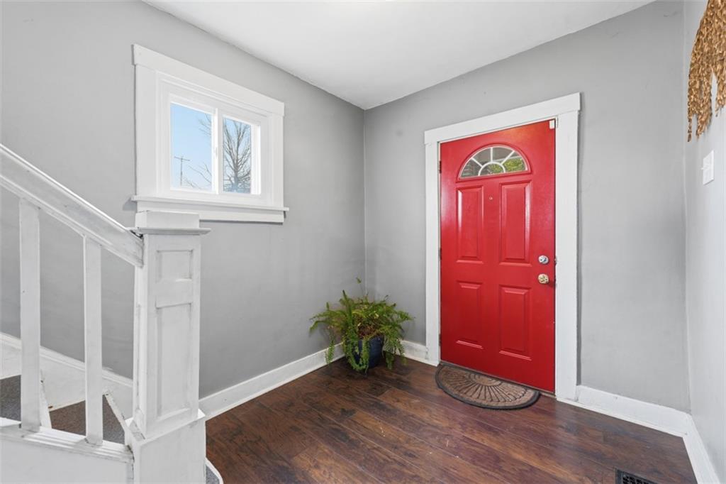 1414 Brinton Road Pittsburgh, PA 15221 - Photo 3 of 20 a view of front door with wooden floor