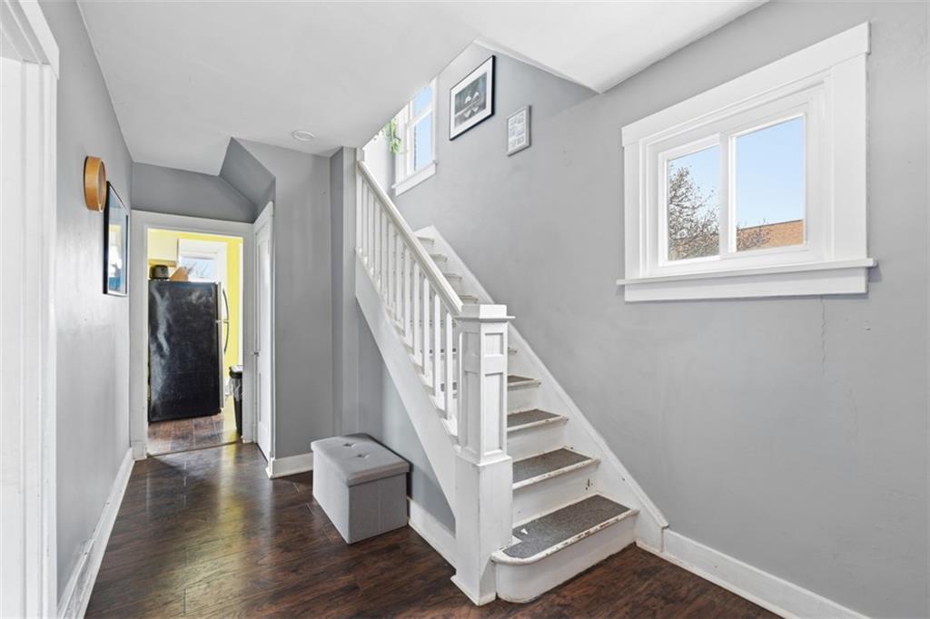 1414 Brinton Road Pittsburgh, PA 15221 - Photo 4 of 20 a view of entryway and hall with wooden floor