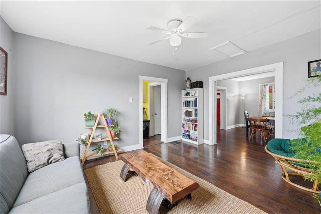 1414 Brinton Road Pittsburgh, PA 15221 - Photo 7 of 20 a living room with furniture and wooden floor