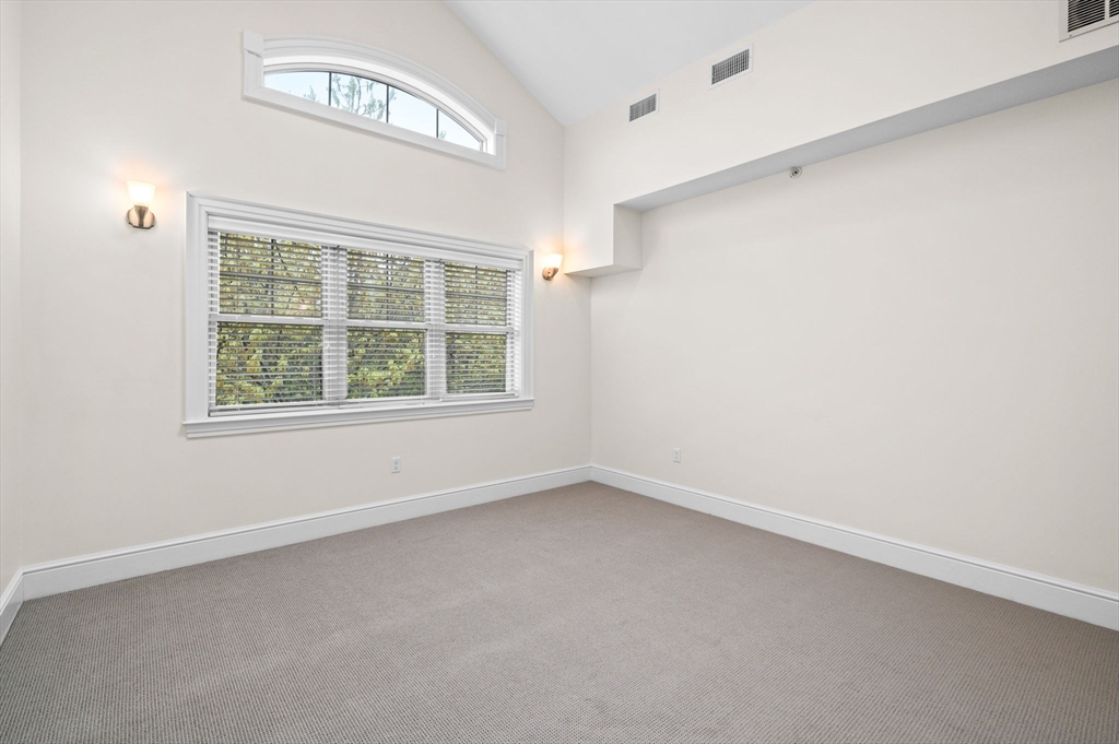 33 Intrepid Circle, Unit 405 Marblehead, MA 01945 - Photo 15 of 31 an empty room with a window