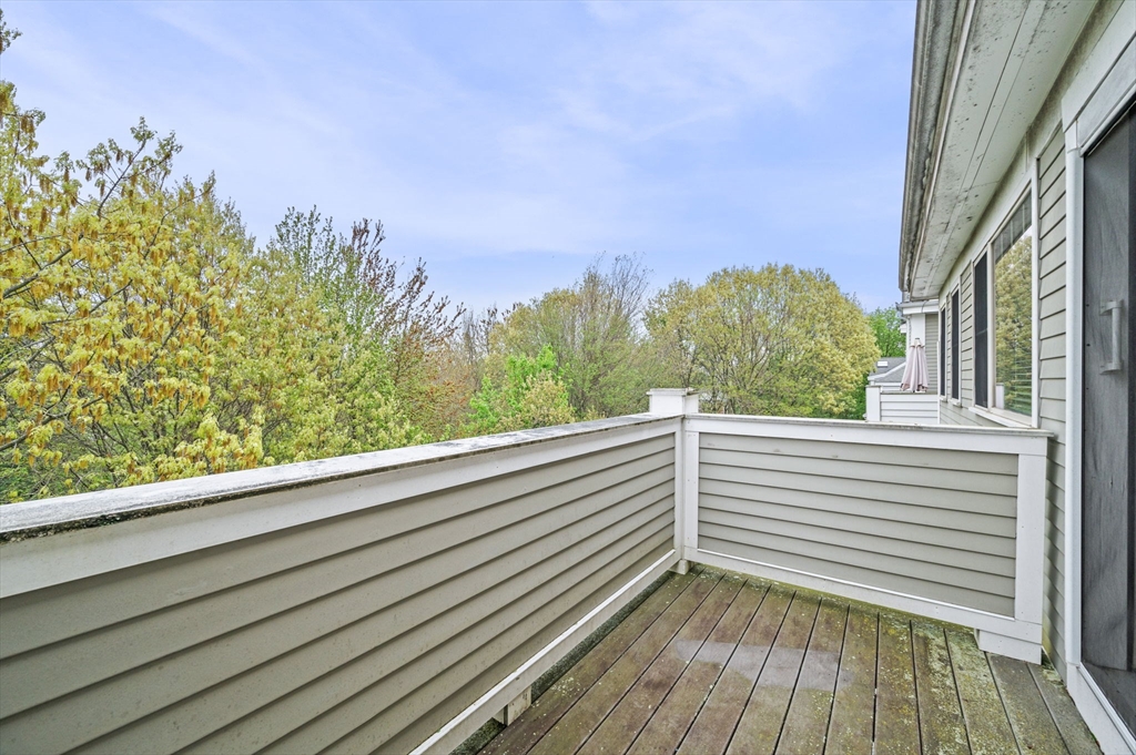 33 Intrepid Circle, Unit 405 Marblehead, MA 01945 - Photo 19 of 31 a view of a balcony with mountain view and wooden floor