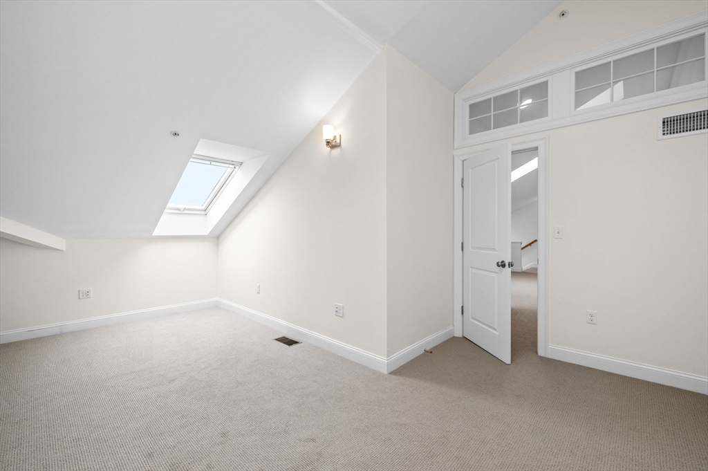 33 Intrepid Circle, Unit 405 Marblehead, MA 01945 - Photo 28 of 31 an empty room with a bathroom