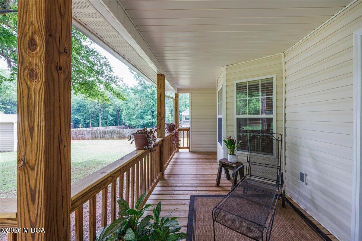 557 Aarons Circle Gray, GA 31032 - Photo 30 of 36 a view of balcony with chairs