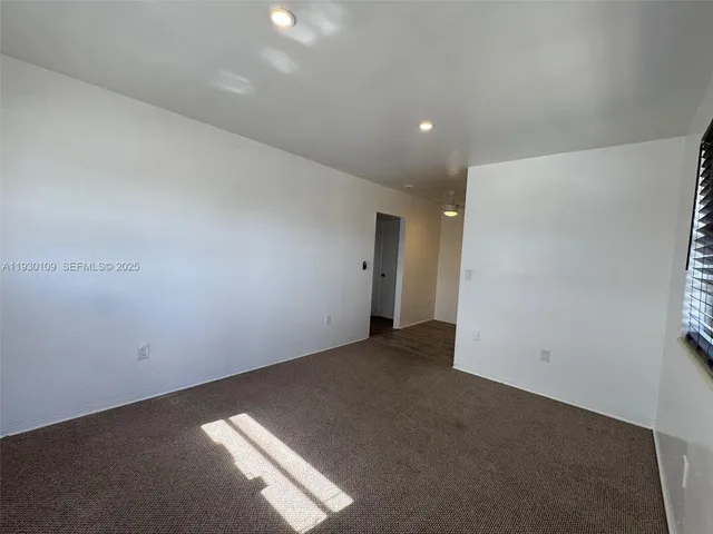 an empty room with a natural light