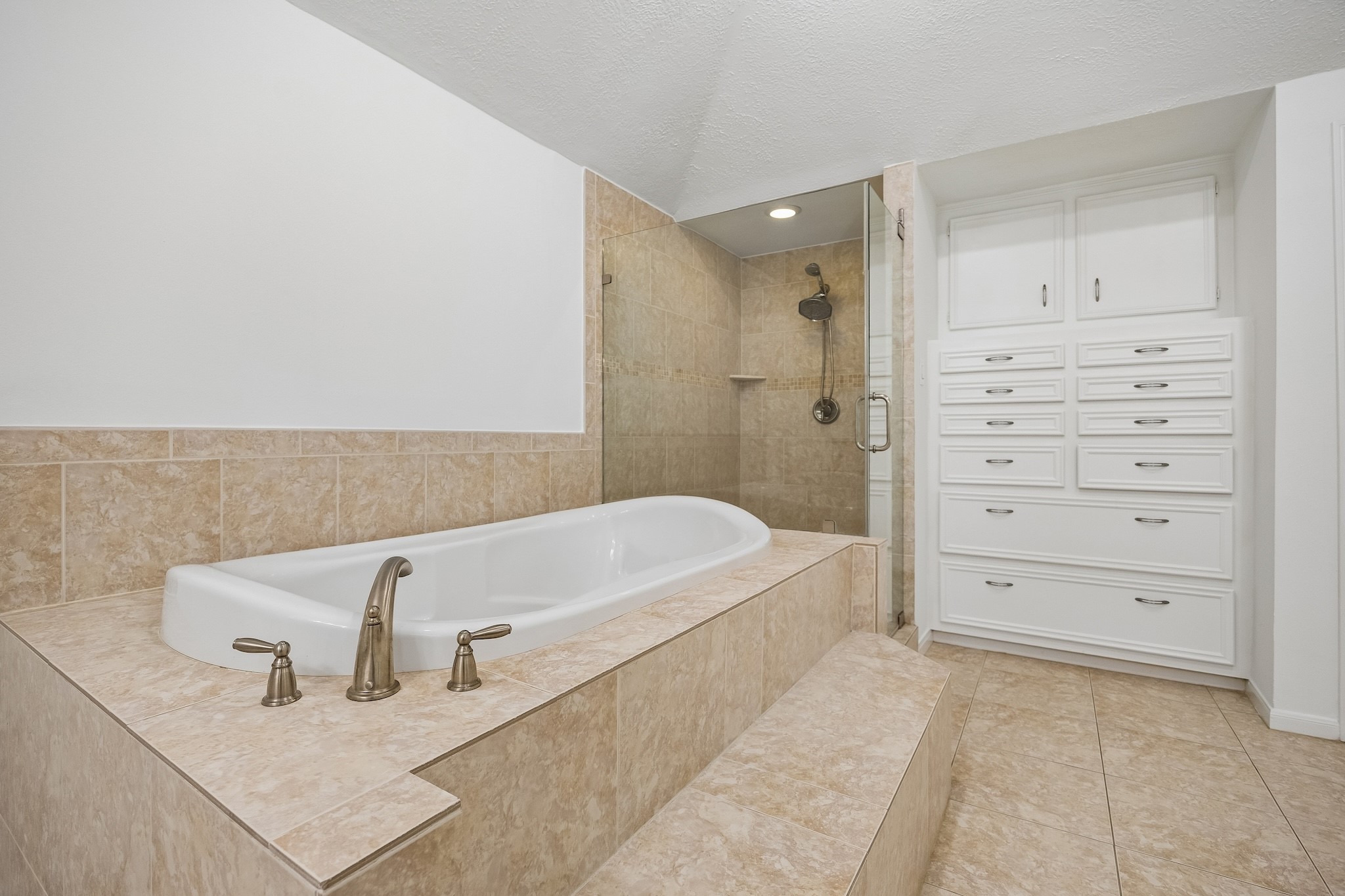 9718 Oxted Lane Spring, TX 77379 - Photo 16 of 38 There's even handy, additional built-in storage cabinets and drawers