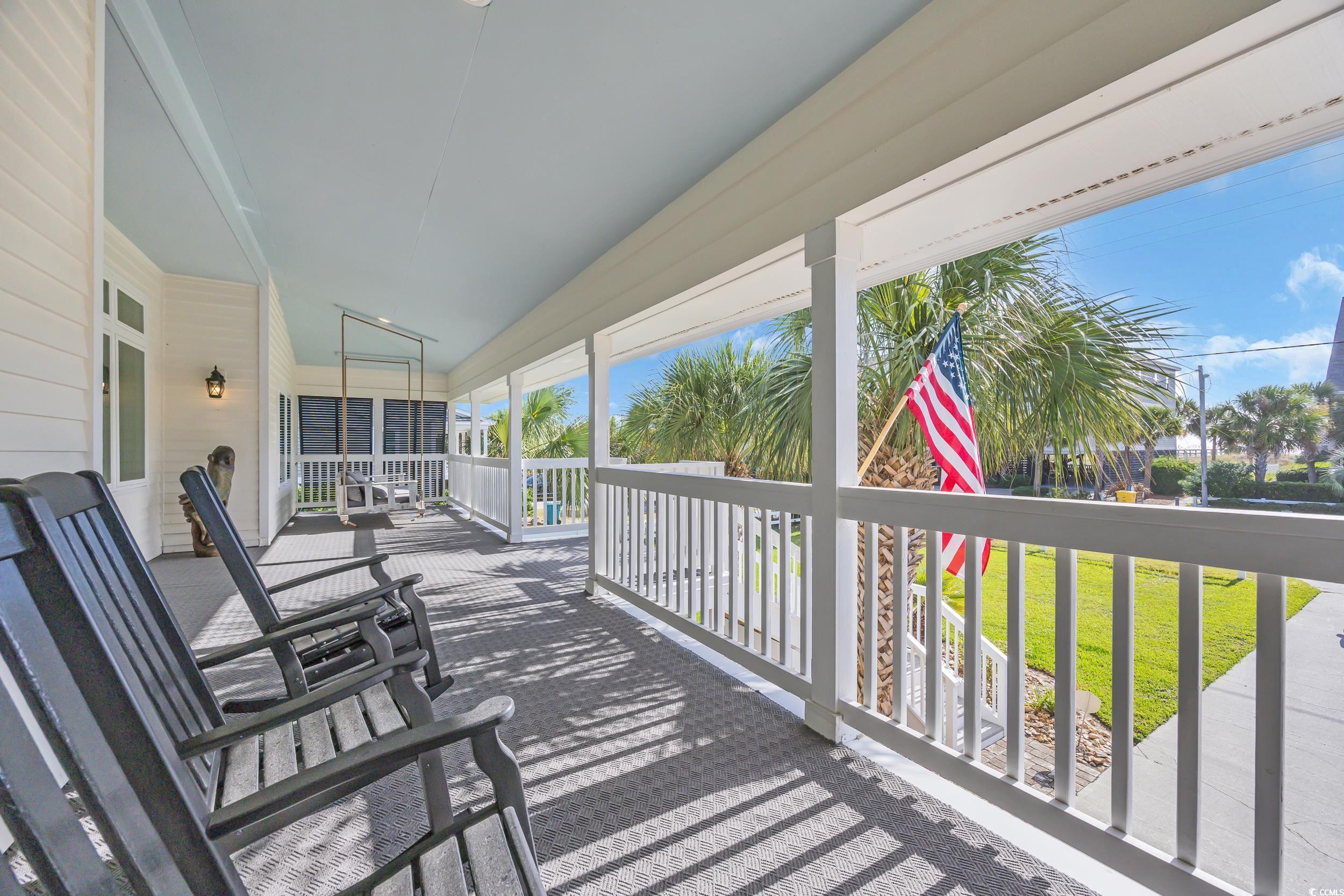1332 South Waccamaw Drive Murrells Inlet, SC 29576 - Photo 12 of 39 Wooden terrace featuring a yard