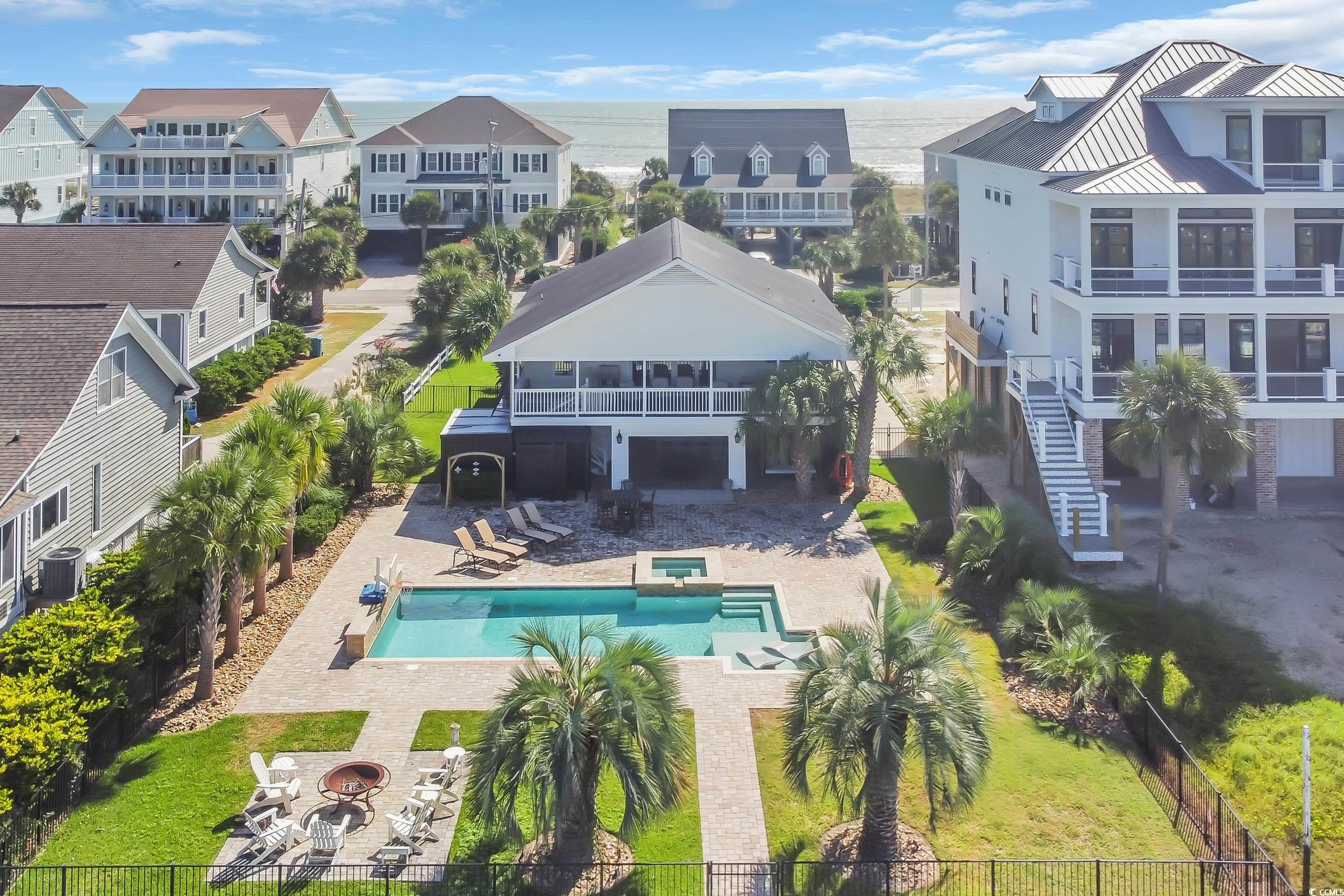 1332 South Waccamaw Drive Murrells Inlet, SC 29576 - Photo 2 of 39 Aerial view of residential area featuring a pool