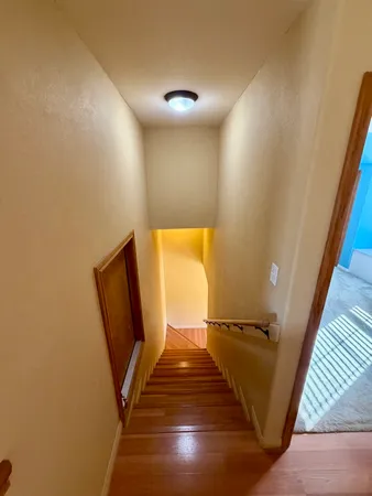 a view of entryway with wooden floor