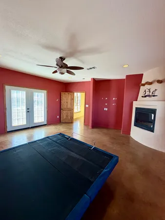 a view of an empty room and window