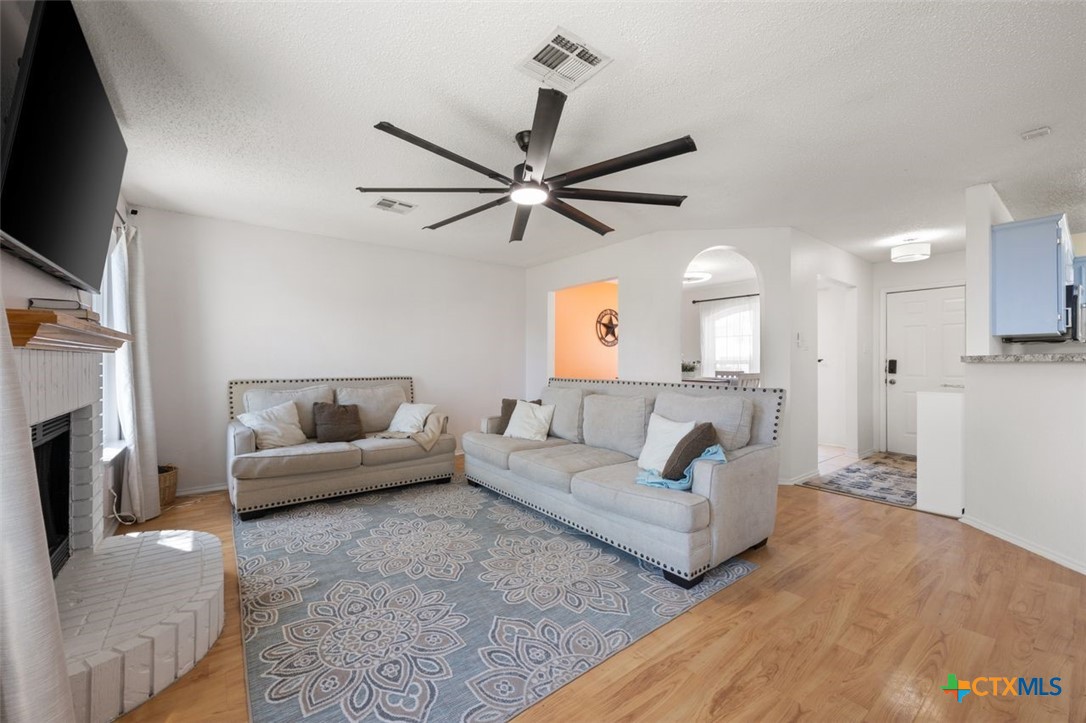 2307 Bernice Circle Copperas Cove, TX 76522 - Photo 11 of 32 a living room with furniture and a fireplace