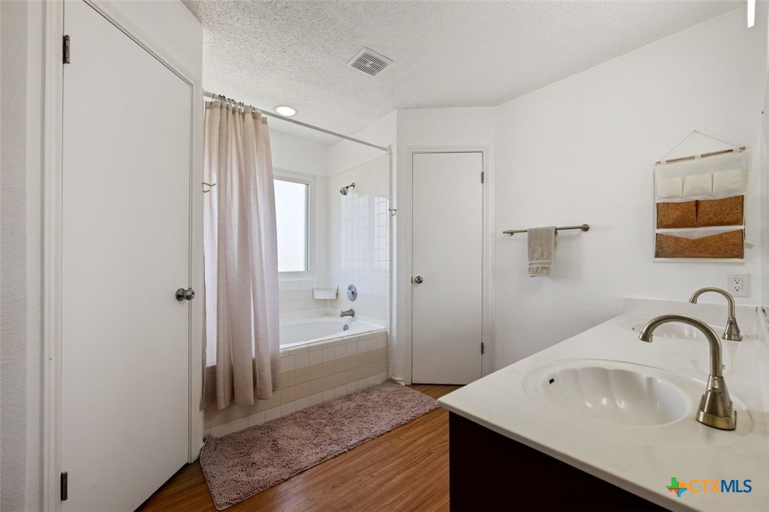 2307 Bernice Circle Copperas Cove, TX 76522 - Photo 22 of 32 a bathroom with a sink and a mirror
