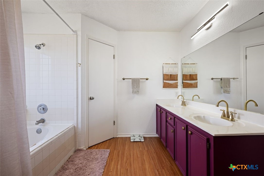 2307 Bernice Circle Copperas Cove, TX 76522 - Photo 23 of 32 a bathroom with a sink and a bathtub