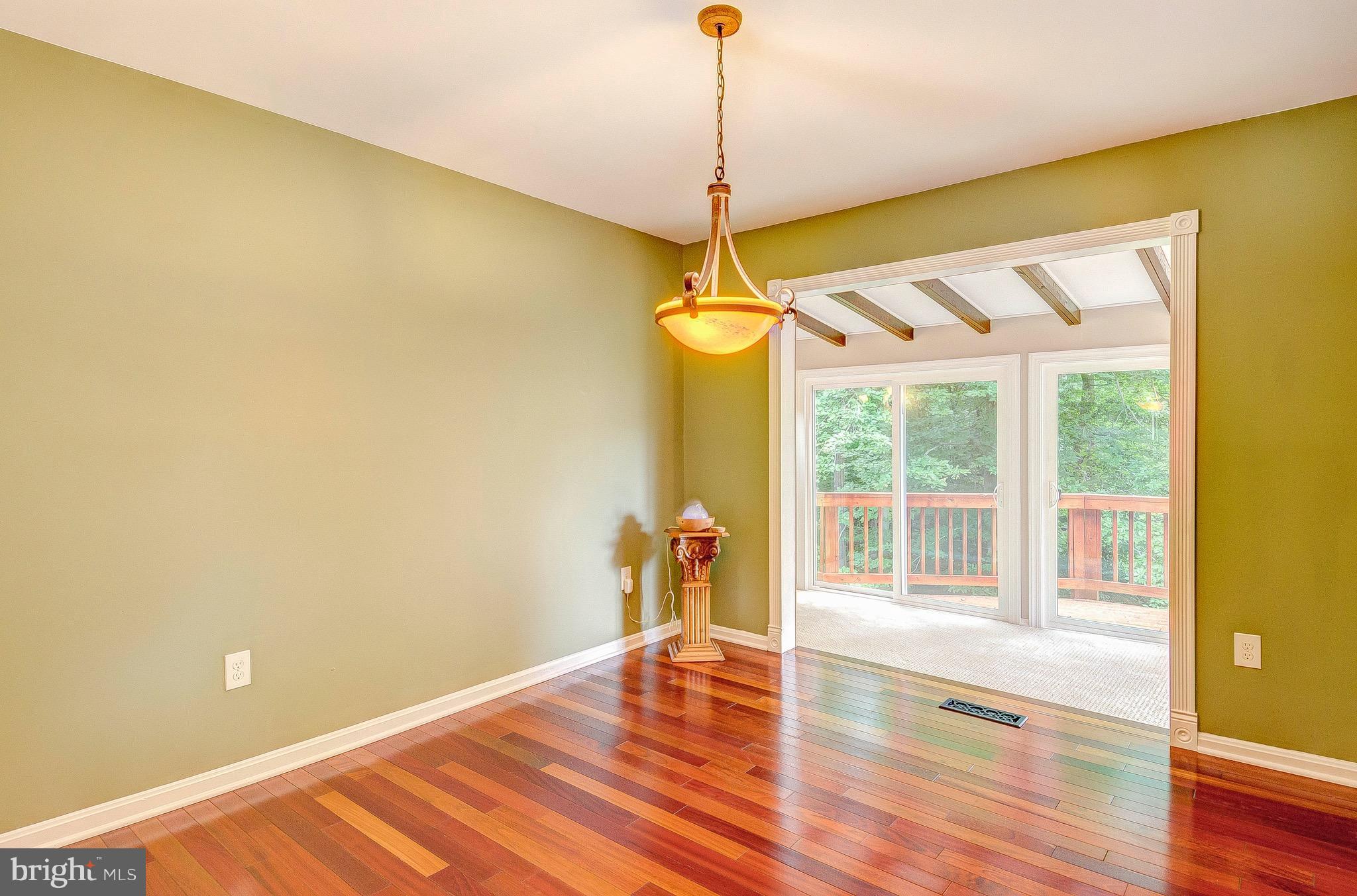 2616 Apple Way Dunkirk, MD 20754 - Photo 11 of 29 a view of empty room with wooden floor and fan