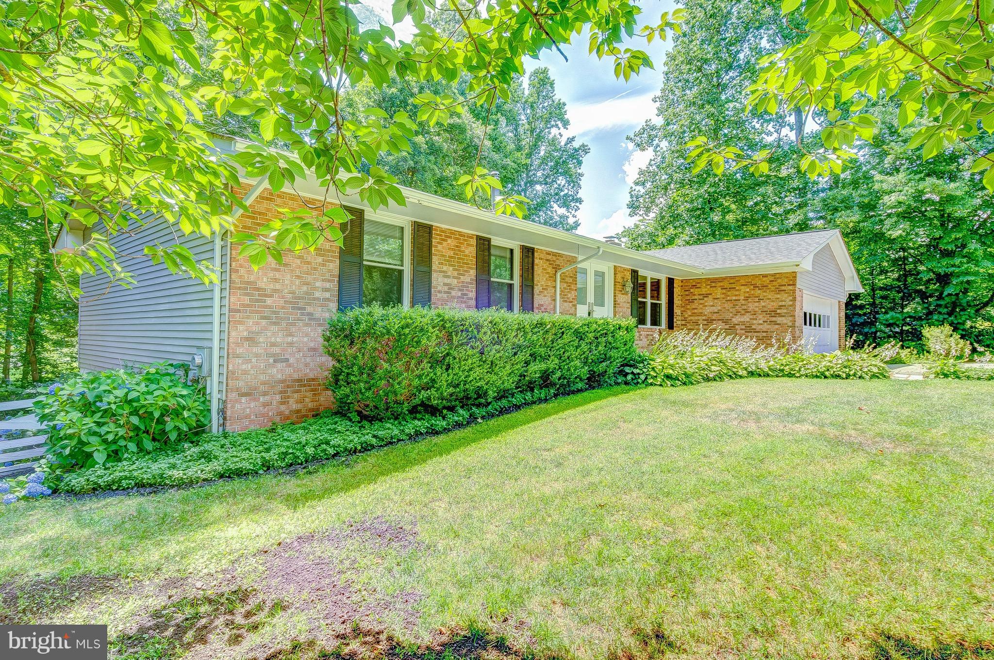 2616 Apple Way Dunkirk, MD 20754 - Photo 4 of 29 a front view of a house with garden