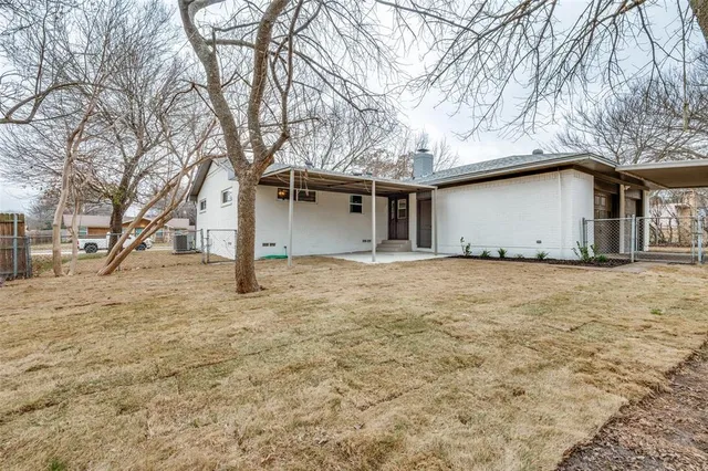 a house with trees in front of it