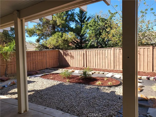 a view of a backyard of a house