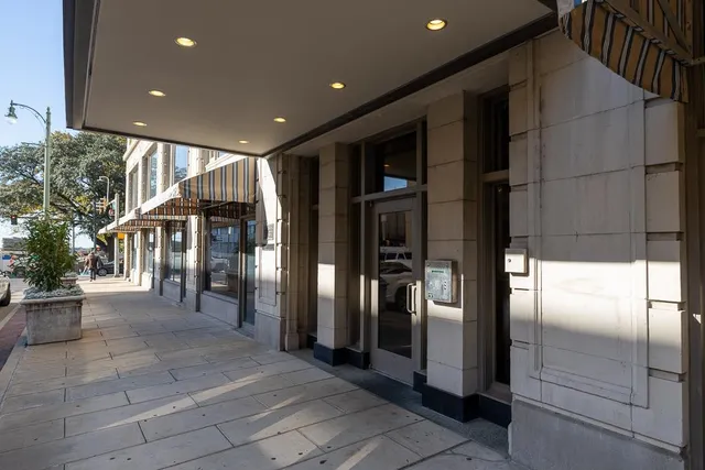 a lobby with entryway door and outdoor space