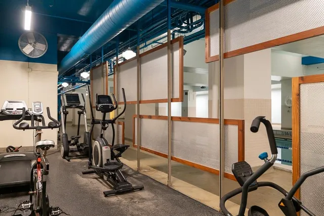 a view of a room with gym equipment