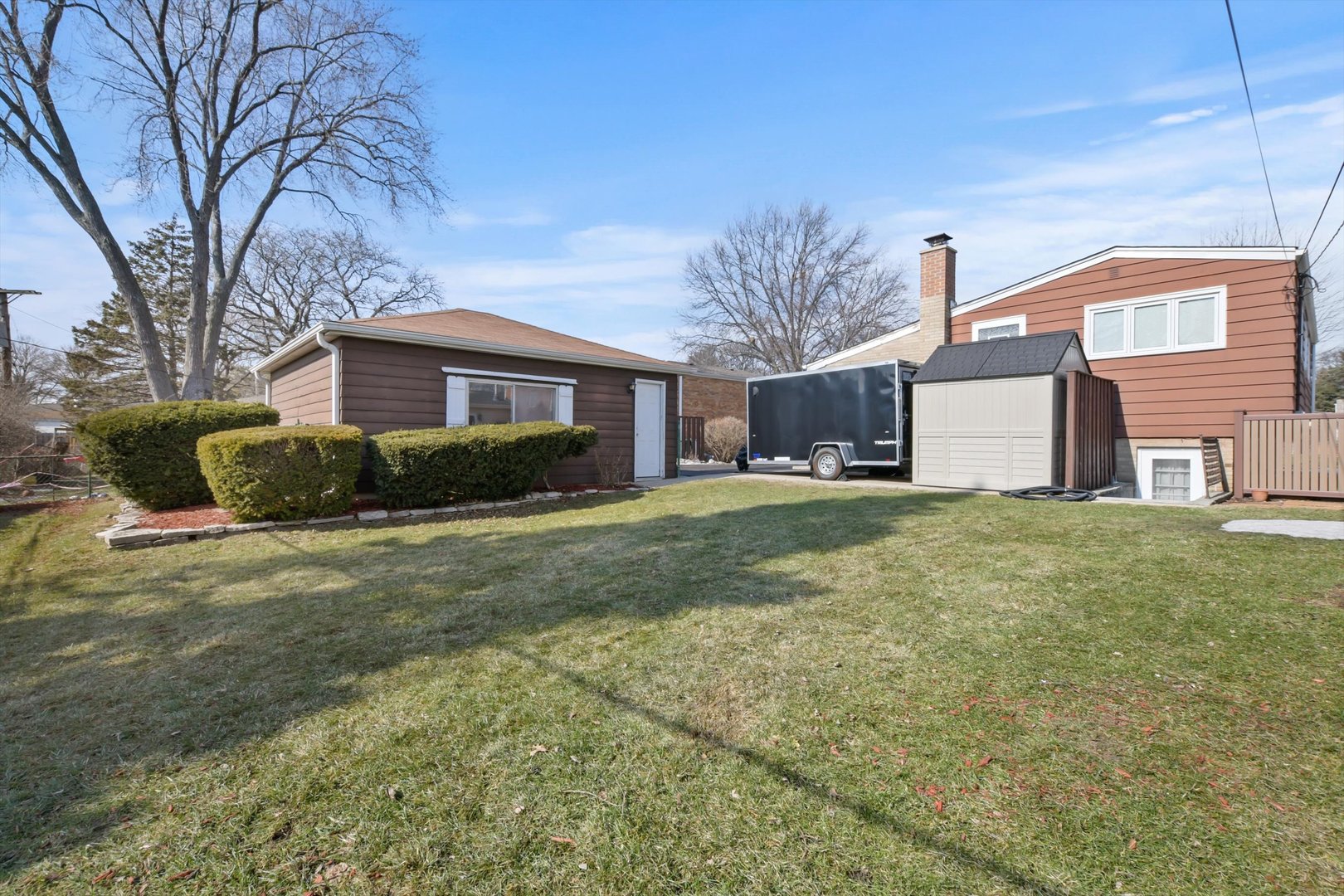 129 Charing Cross Road Lombard, IL 60148 - Photo 18 of 18 a front view of a house with a yard