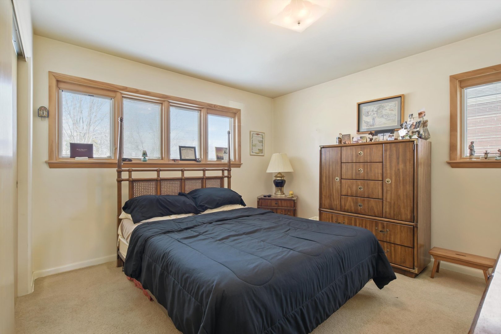 129 Charing Cross Road Lombard, IL 60148 - Photo 8 of 18 a bedroom with a bed and window