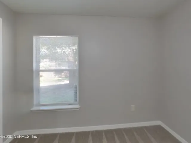 a view of a small space with window