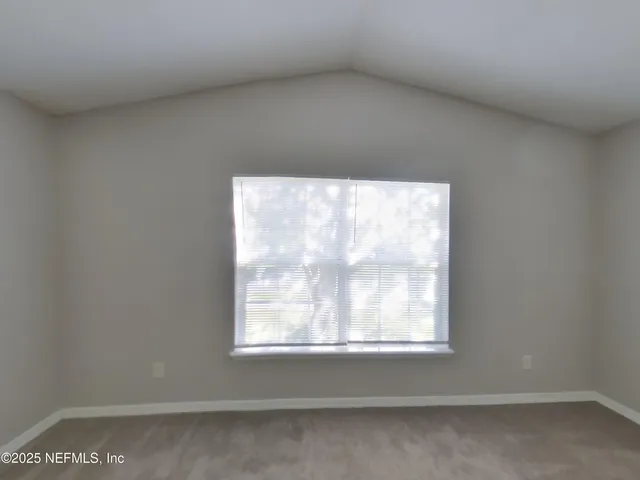 a view of a small space with window