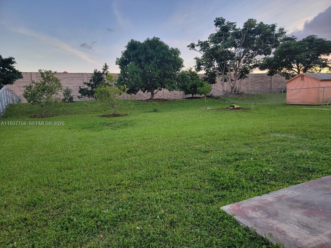 14860 Southwest 307th Street Homestead, FL 33033 - Photo 3 of 14 a view of a green field with trees