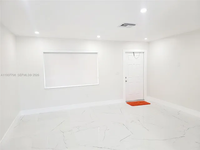 a view of a room with rack on the wall