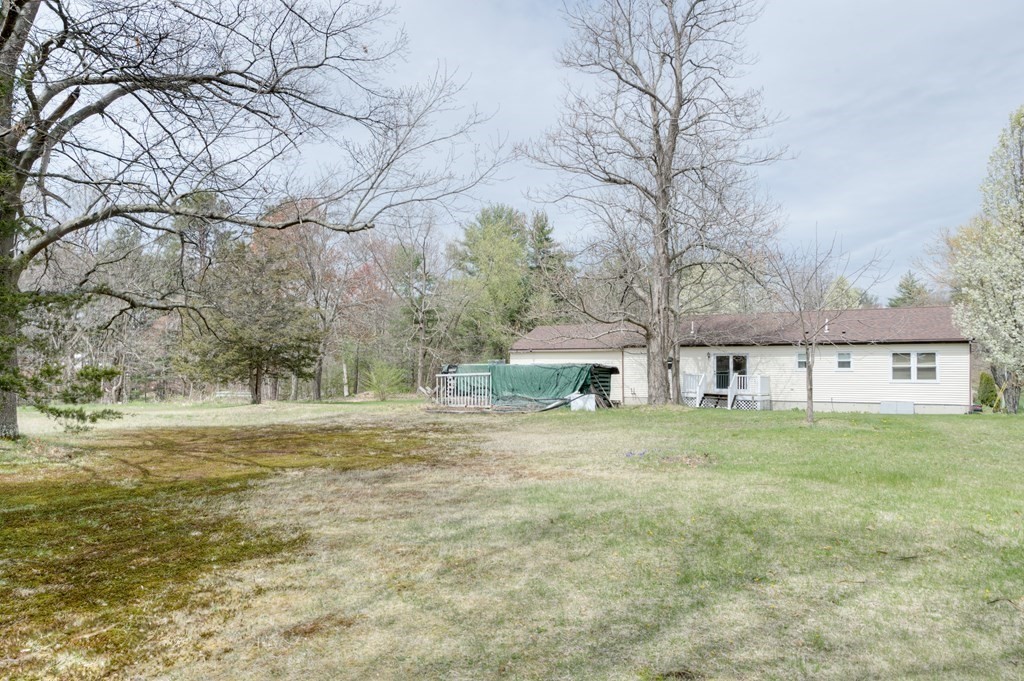 23 Riverside Street Three Rivers, MA 01080 - Photo 26 of 33 a big yard with large trees