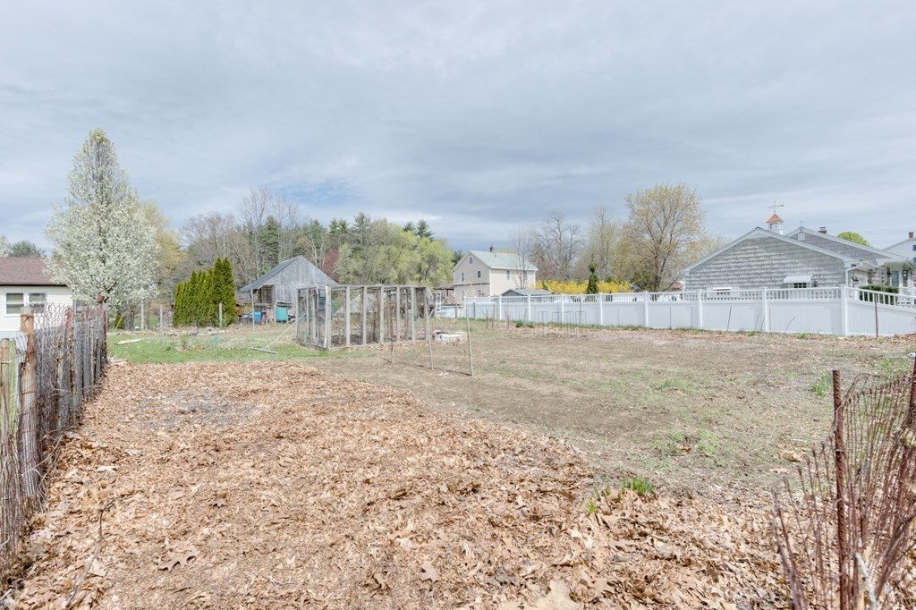 23 Riverside Street Three Rivers, MA 01080 - Photo 27 of 33 a view of a yard with wooden fence