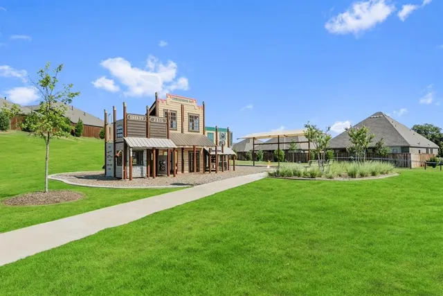 a view of outdoor space with trees all around