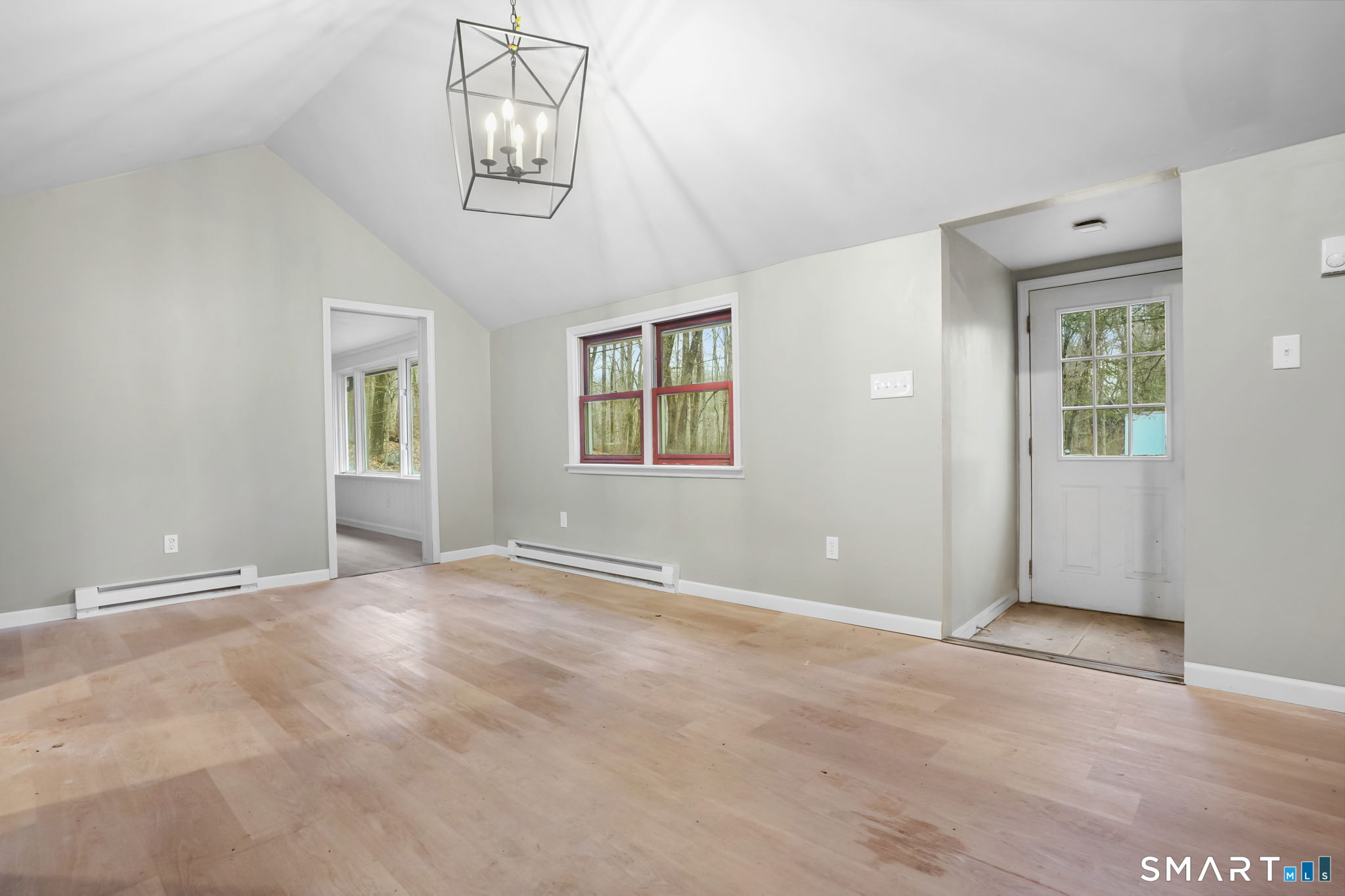 71 Picketts Ridge Road Redding, CT 06896 - Photo 13 of 32 an empty room with windows and closet