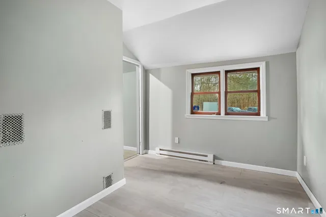 an empty room with windows