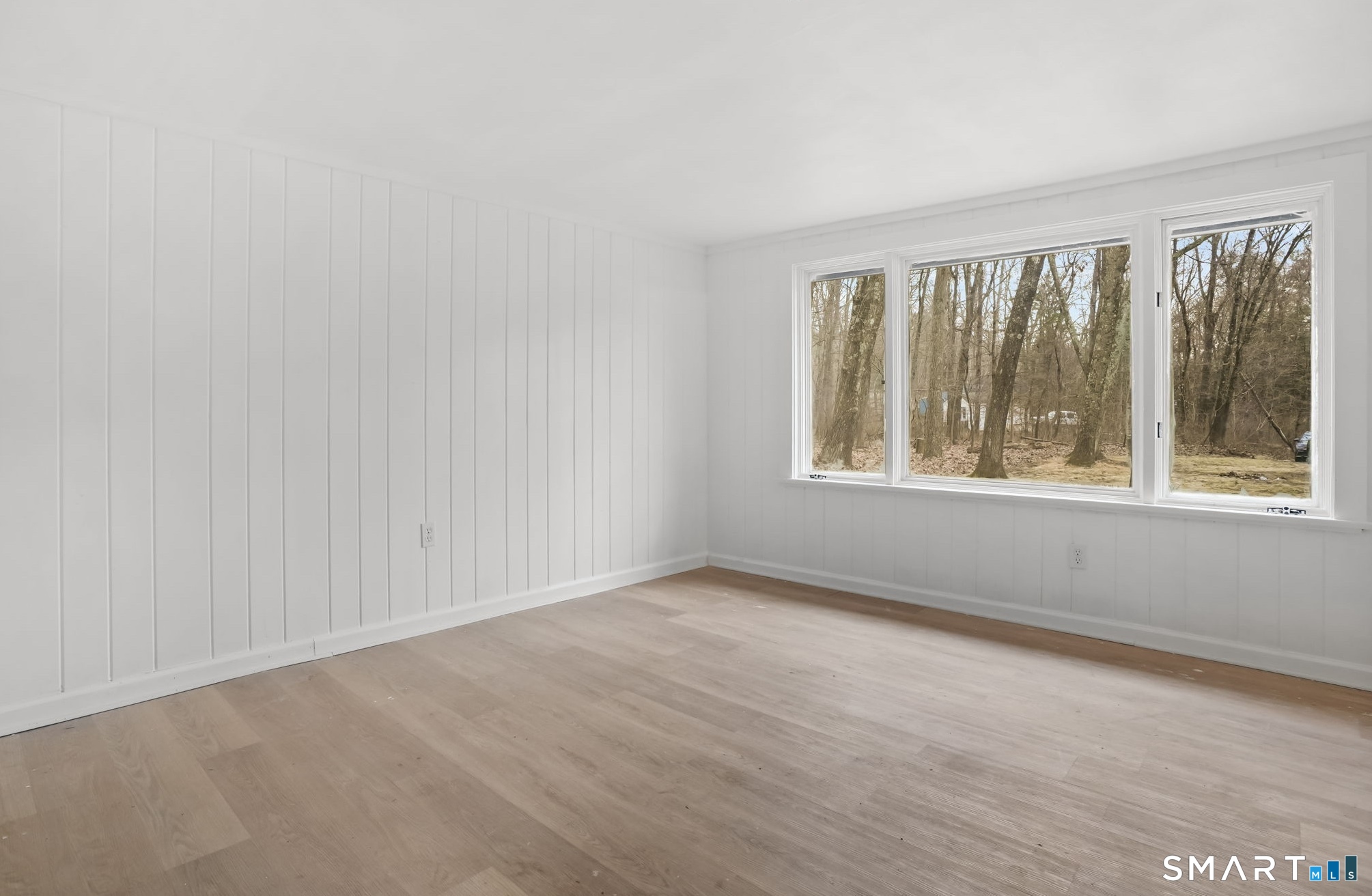 71 Picketts Ridge Road Redding, CT 06896 - Photo 15 of 32 a view of an empty room with a window