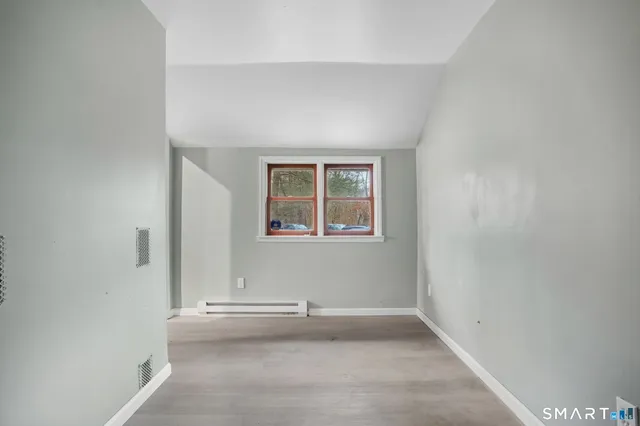 an empty room with windows