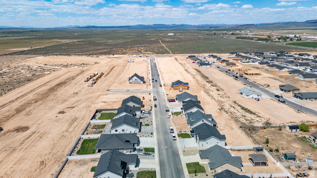 4978 North 75 East Enoch, UT 84721 - Photo 55 of 60 Developing residential area featuring single-story homes with dark shingle roofs