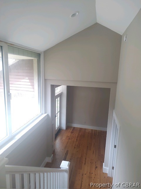 173 Lillys Neck Road Moon, VA 23119 - Photo 38 of 48 Hall featuring dark hardwood / wood-style floors and vaulted ceiling