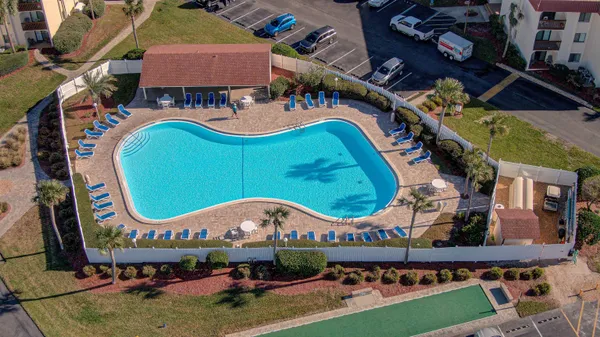 a view of swimming pool with living room