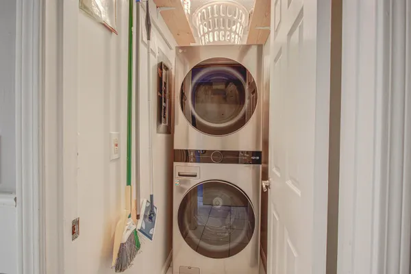 a kitchen with a refrigerator sink and microwave