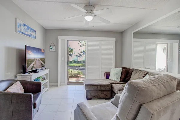 a living room with furniture and a couch