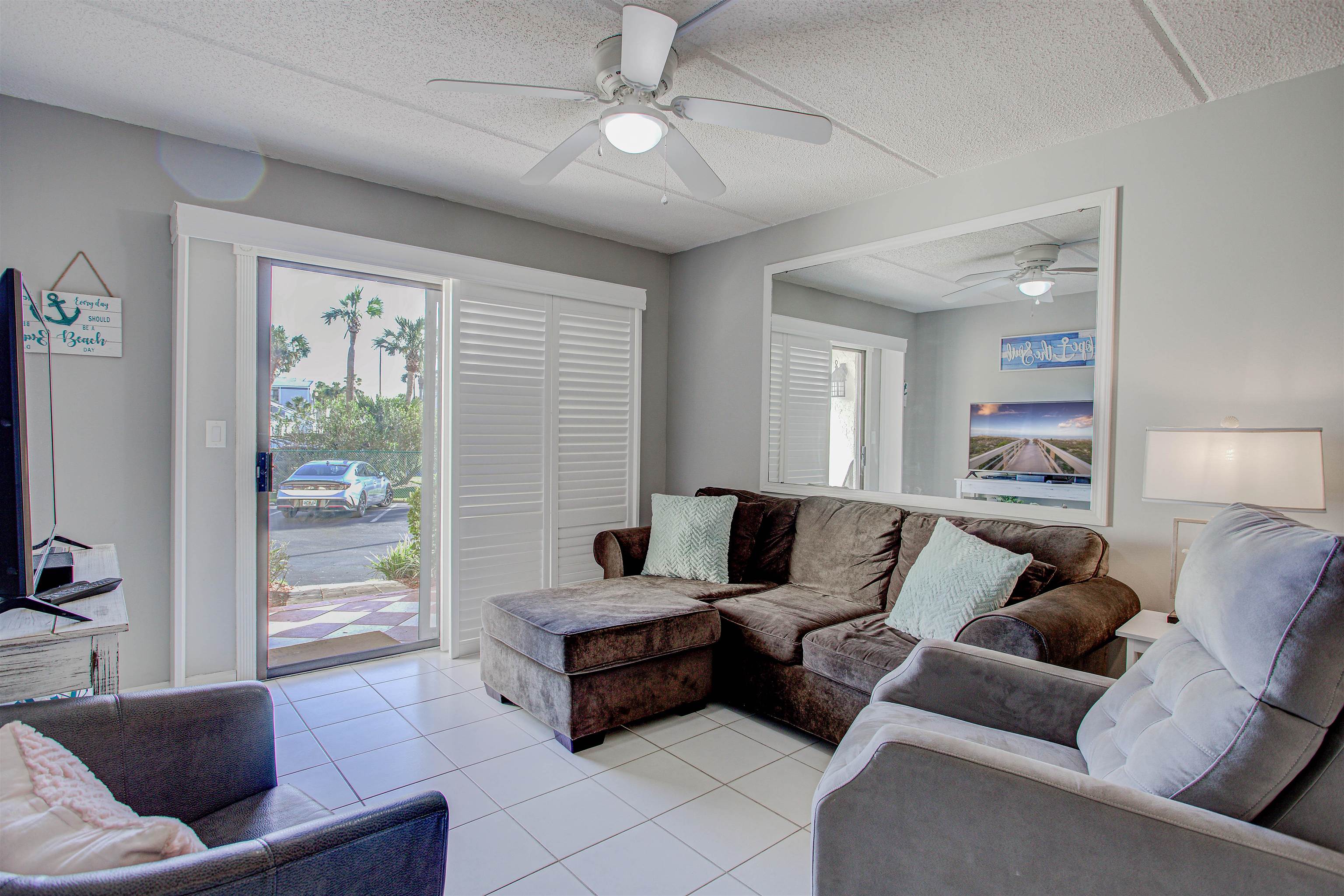 880 A1A Beach Boulevard, Unit 3118 St. Augustine Beach, FL 32080 - Photo 33 of 55 a living room with furniture and a window