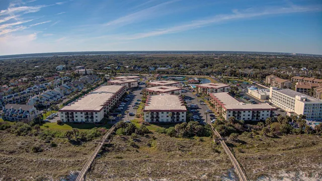 an aerial view of a house with a garden