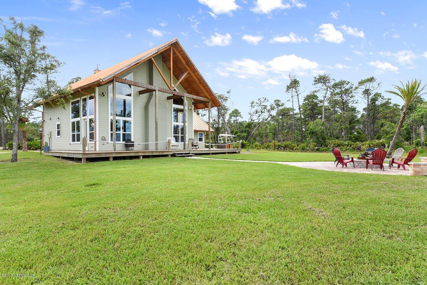 12715 Sawpit Road Jacksonville, FL 32226 - Photo 20 of 35 a front view of a house with a yard
