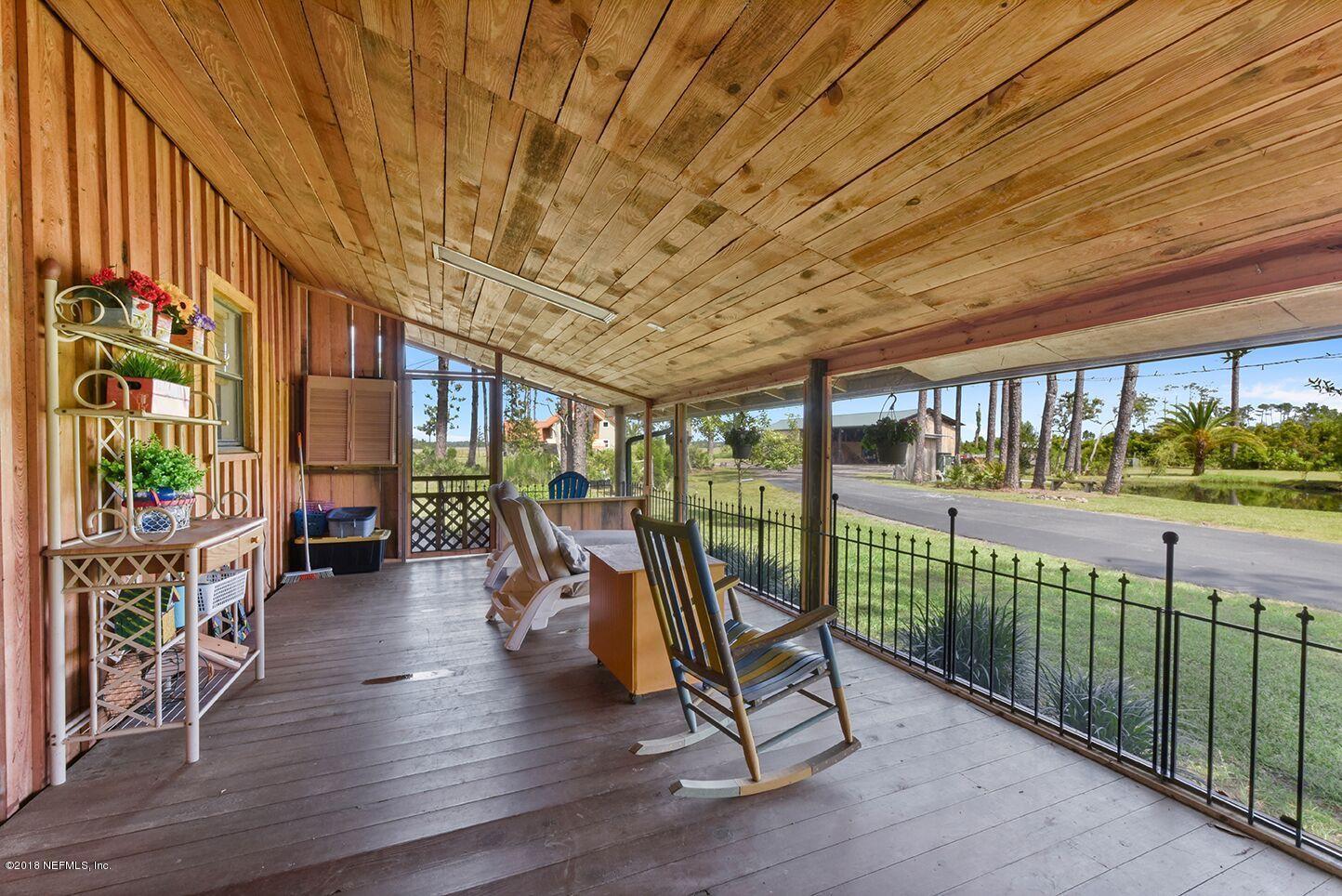 12715 Sawpit Road Jacksonville, FL 32226 - Photo 26 of 35 a view of a porch with furniture and garden view