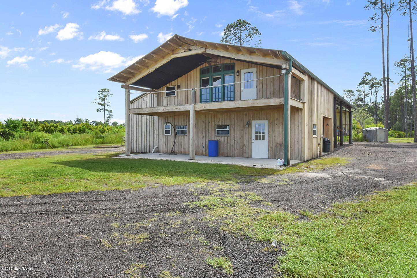 12715 Sawpit Road Jacksonville, FL 32226 - Photo 30 of 35 a front view of a house with garden