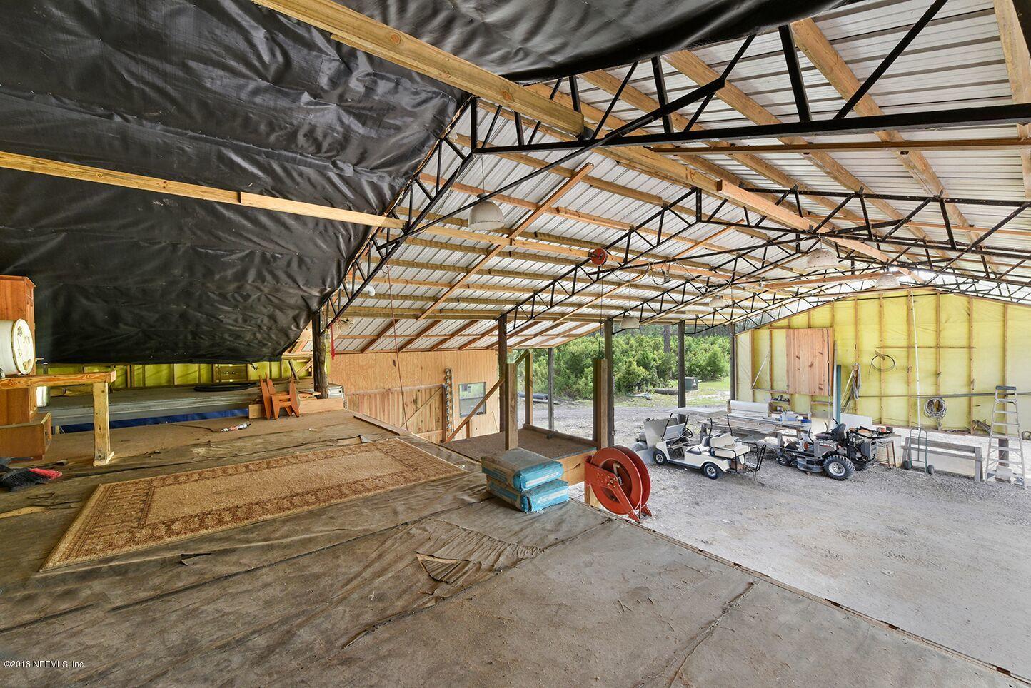 12715 Sawpit Road Jacksonville, FL 32226 - Photo 31 of 35 a view of garage with furniture